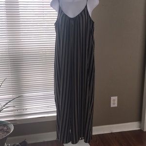 Adorable v-neck, adjustable strap boho jumpsuit.